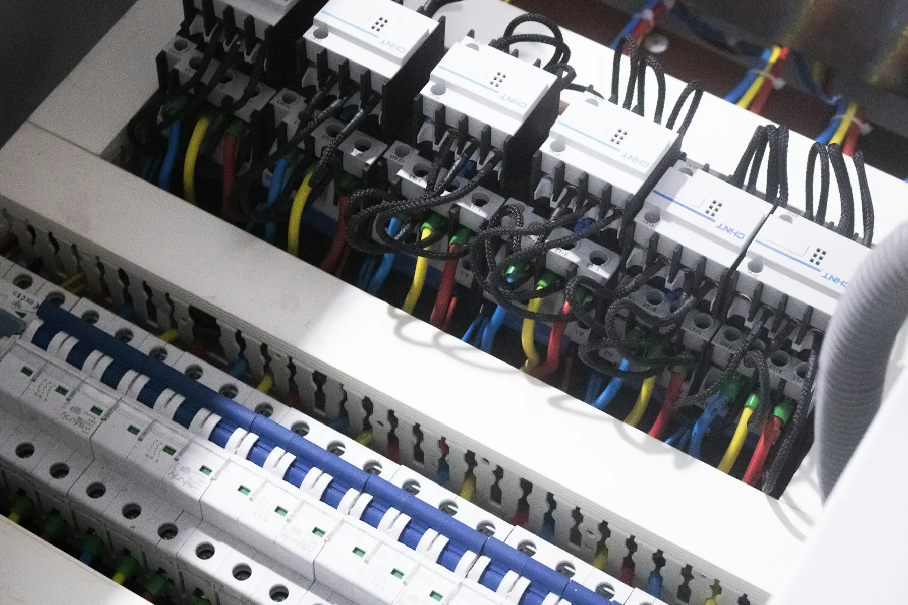 Neatly wired breakers inside a distribution board